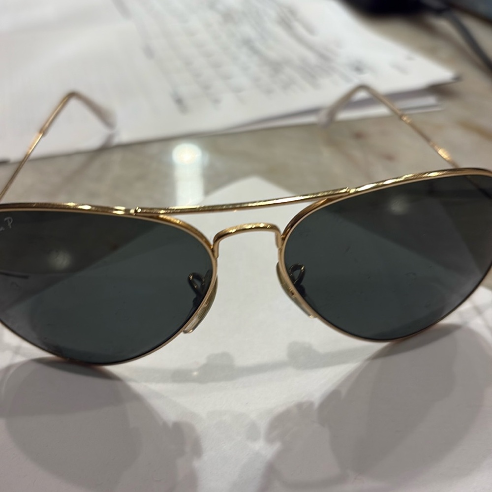 Classic ray ban aviators.  Best sunglasses ever made   Worn for sure with love